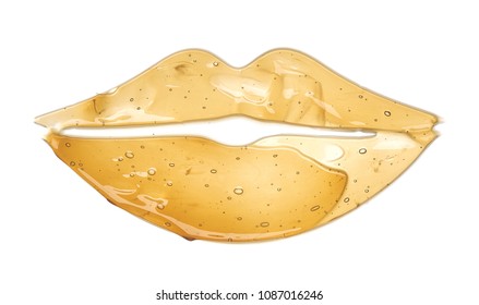 Transparent yellow smear of face cream or golden honey in the shape of lips isolated on white background. Golden creamy honey texture on white background