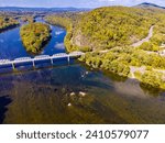 Transport bridge over the Potomac River on the border of Virginia and Maryland. Aerial view of nature and traffic