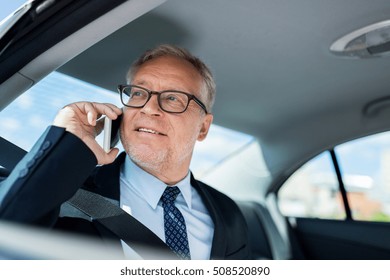 transport, business trip, technology and people concept - senior businessman calling on smartphone and driving on car back seat - Powered by Shutterstock