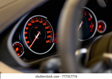 Transport Concept - Close Up. Car Panel Instrument Red Speedometer And Tachometer. Transport Concept - Close Up.