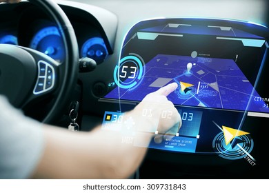 Transport, Destination, Modern Technology And People Concept - Male Hand Searching For Route Using Navigation System On Car Dashboard Screen