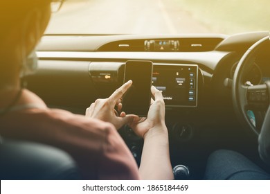 Transport Driving Concept A Man Wearing A Smartphone Mask While Driving In The Morning
