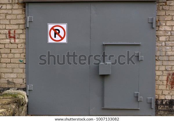 transport Parking\
garage gate with the\
sign