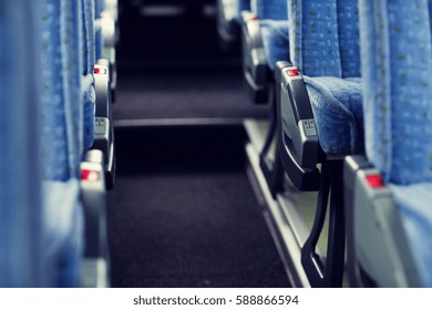 Transport, Tourism, Road Trip And Equipment Concept - Travel Bus Interior And Seats