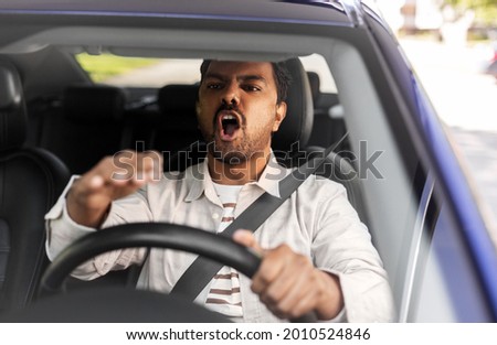 Similar – Image, Stock Photo man in driving car with arms out of the window