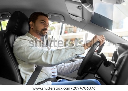 Similar – Image, Stock Photo man in driving car with arms out of the window