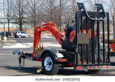 transportation excavator on a trailer construction equipment, a small hydraulic