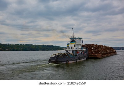 Transportation Industry. Ship Barge Transports Scrap Metal And Sand With Gravel