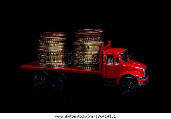 Transportation of Money for the Red Toy Truck\
Business Concept