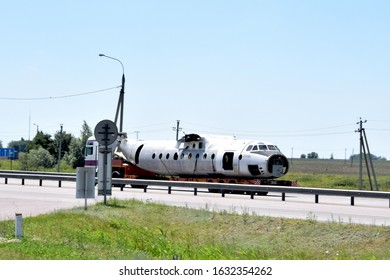 Transportation Of The Skeleton Of A Passenger Plane By Truck Along The Highway