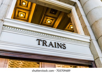 Transportation train sign inside building with golden lights