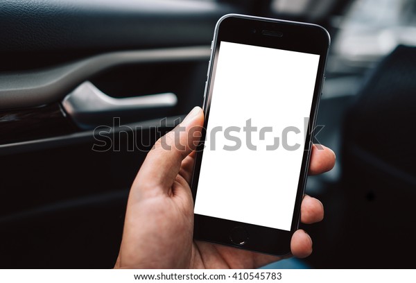 transportation and vehicle concept - man using\
smart phone with blank screen in the car\
