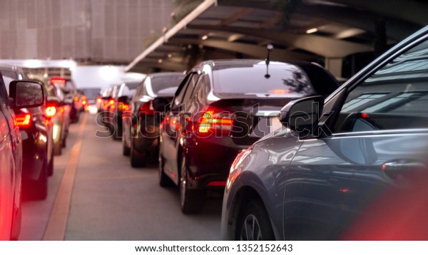 transportation vehicle and traffic concept -\
Blurred traffic jam and car brake light in bangkok, thailand on\
evening and copy\
space