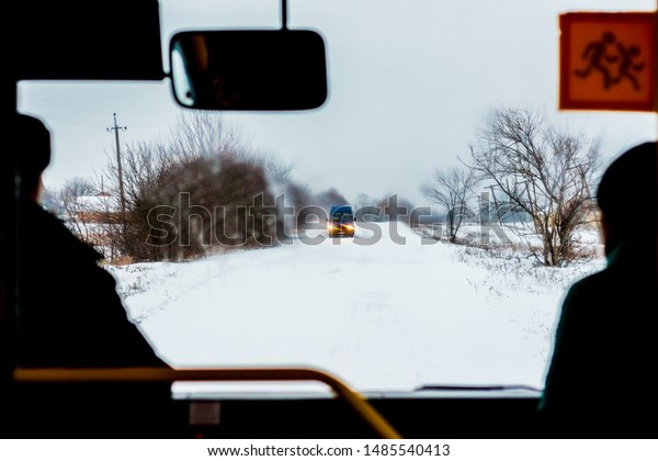 Transportation in
winter. Winter road from bus
window