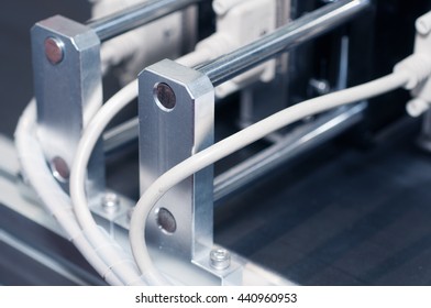 Transporter supply line for bar code printing close up detail