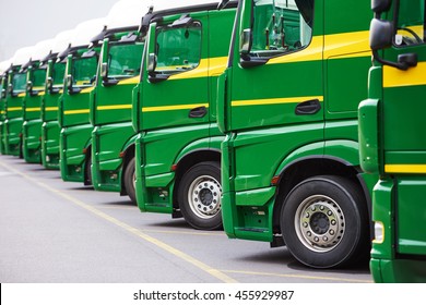 transporting freighting service company. commercial logistics delivery lorry trucks in row