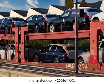 Transporting New Automobiles: A Modern German Auto Carrier With A Full Load Of Automobiles. Heidelberg, Germany - June 4, 2022