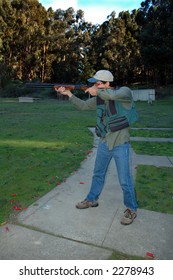 Trap Shooter Practicing Swing On A Trap Range