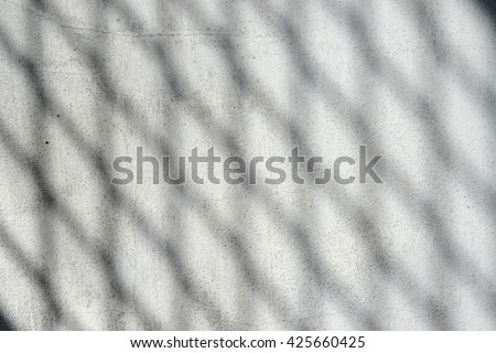 Trapezium sqaure shadow texture on Cement wall