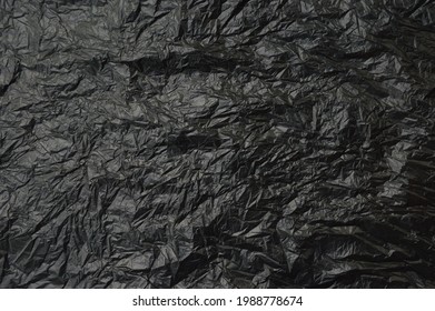 Trash Bag Texture Background, Black Crumpled Plastic Wall As Wallpaper