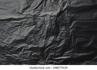 Trash Bag Texture Background, Black Crumpled Plastic Wall As Wallpaper