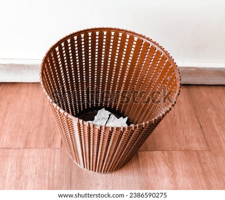 Trash bin wastebin garbagebin litterbasket trashbarrel trashcan wastebasket wastepaper basket dustbin rubbishbin image photo