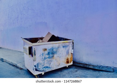 Trash Can In An Alleyway