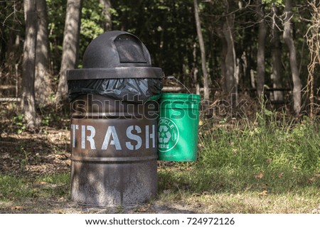 Trash can in the forest.
