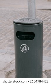trash can marked Do not litter. green round container for waste collection. garbage sorting, eco-friendly care of nature. recycling and disposal of harmful and toxic waste.