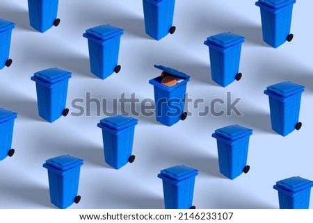 Trash cans pattern in pastel background. Plastic plugs in one garbage can represents pollution and recycle material. 
Environment awareness and recycle minimal concept.