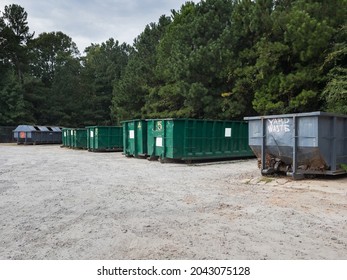 Trash Collection Bins At The Local Landfill Dump Recycle Center. 