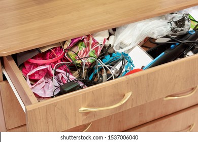 Trash, Dirt, Mess In The Dresser Drawer, Different Things.