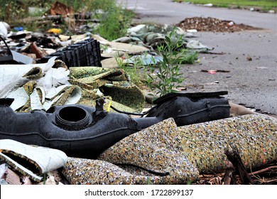 Trash Illegally Dumped On A Neighborhood Street In Detroit, Michigan.