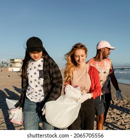 Trash Pick Up Volunteering, Group Of Teenagers At The Beach