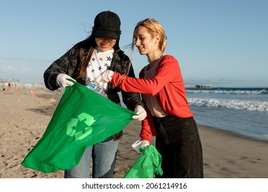 Trash Pick Up Volunteering, Teen Friends At The Beach