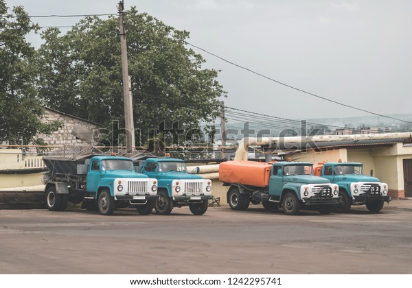 trash truck or dump-truck municipality\
sanitation salubrity truck fleet of city vehicles for urban garbage\
collector service with retro car transportation for sanitation\
services to city\
residents