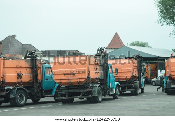 trash truck or dump-truck municipality\
sanitation salubrity truck fleet of city vehicles for urban garbage\
collector service with retro car transportation for sanitation\
services to city\
residents