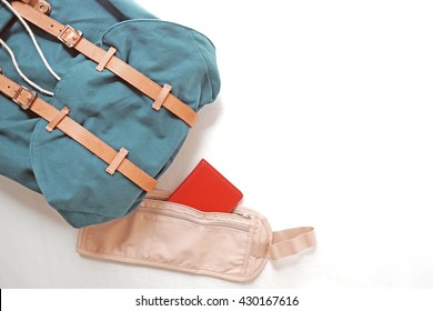 Travel Accessories Consist Of Backpack, Money Pouch And Passport. Concept Of Travel.