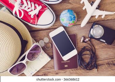 Travel accessories costumes. Passports, luggage, The cost of travel maps prepared for the trip - Powered by Shutterstock