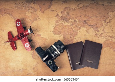  Travel accessories for plan trip on world map background with camera ,passport. traveling concept .top view. Journey planning. Space for text or products.  - Powered by Shutterstock