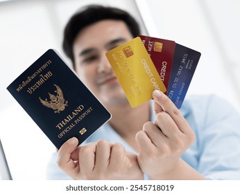 Travel action passport and credit card display thailand financial documentation indoor environment close-up view travel essentials concept - Powered by Shutterstock