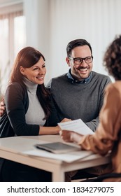 Travel Agent Talking With Clients