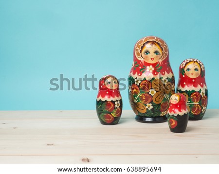 Travel around the world for your colorful life .Enjoy the funny trip journey .Top view for copy space some idea your create destination .object  cute  ,  Set of matrioshka dolls on color background.