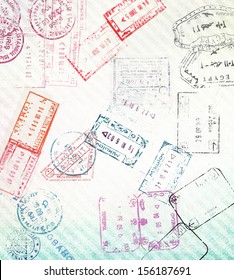 Travel Background With Different Passport Stamps