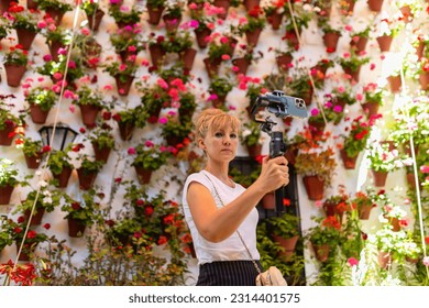 Travel blogger visits Patio Festival in Cordoba, Spain, Andalusia - Shutterstock ID 2314401575