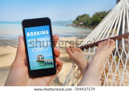 travel booking, hotels and flights reservation on the screen of smartphone