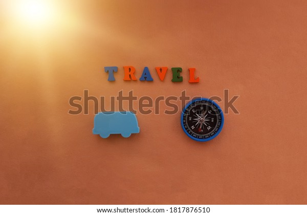 Travel, bus, compass on a light brown
background. Bus tour,
excursions.