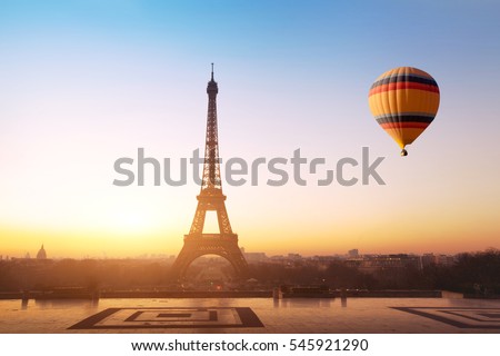travel concept, beautiful view of hot air balloon flying near Eiffel tower  in Paris, France, tourism in Europe
