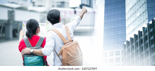 Travel Concept. Group Of Traveller With Map And Enjoying Cityscape. Explore The City. 