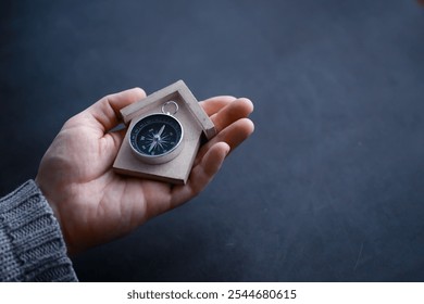 Travel concept. Magnetic compass in the hand. Retro navigator in hand map and airplane background. Adventure Background. - Powered by Shutterstock